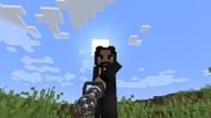 MrCrayfish's Gun Mod is one of the most popular weapon mods in the community (Image via Mojang Studios || Curseforge/@MrCrayfish)